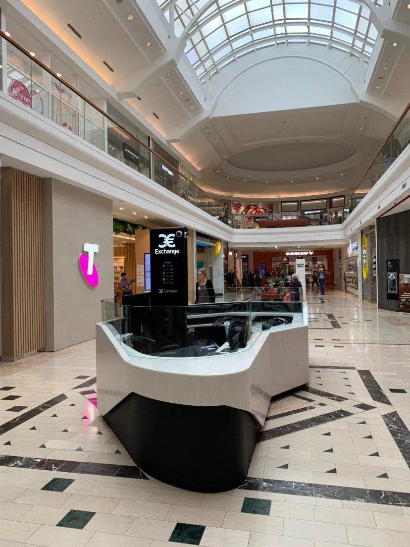 The Eastland counter seen from the mall walkway, with the rate board facing the aisle.