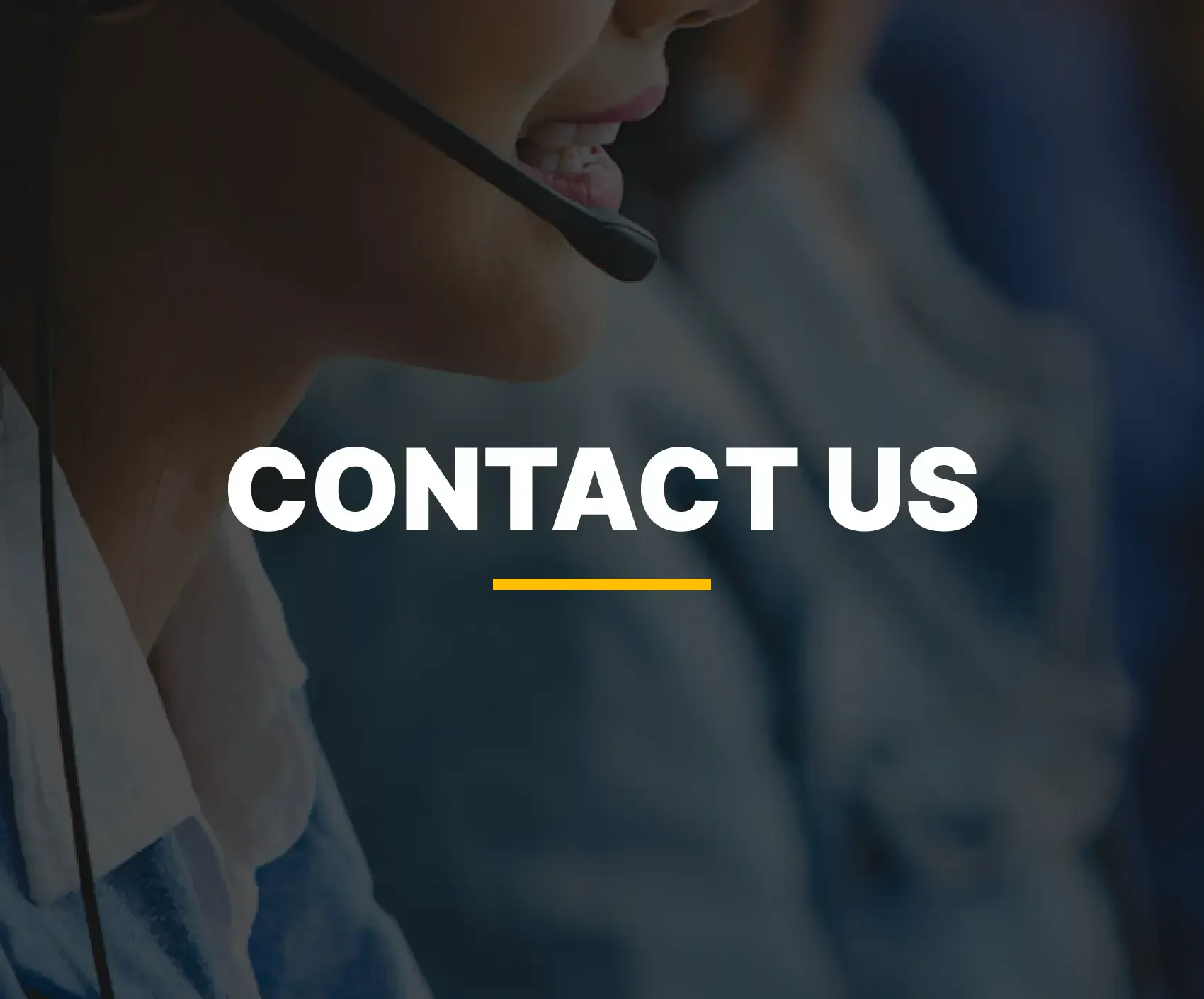 A customer service agent wearing a headset, with the words Contact Us set over the photograph.